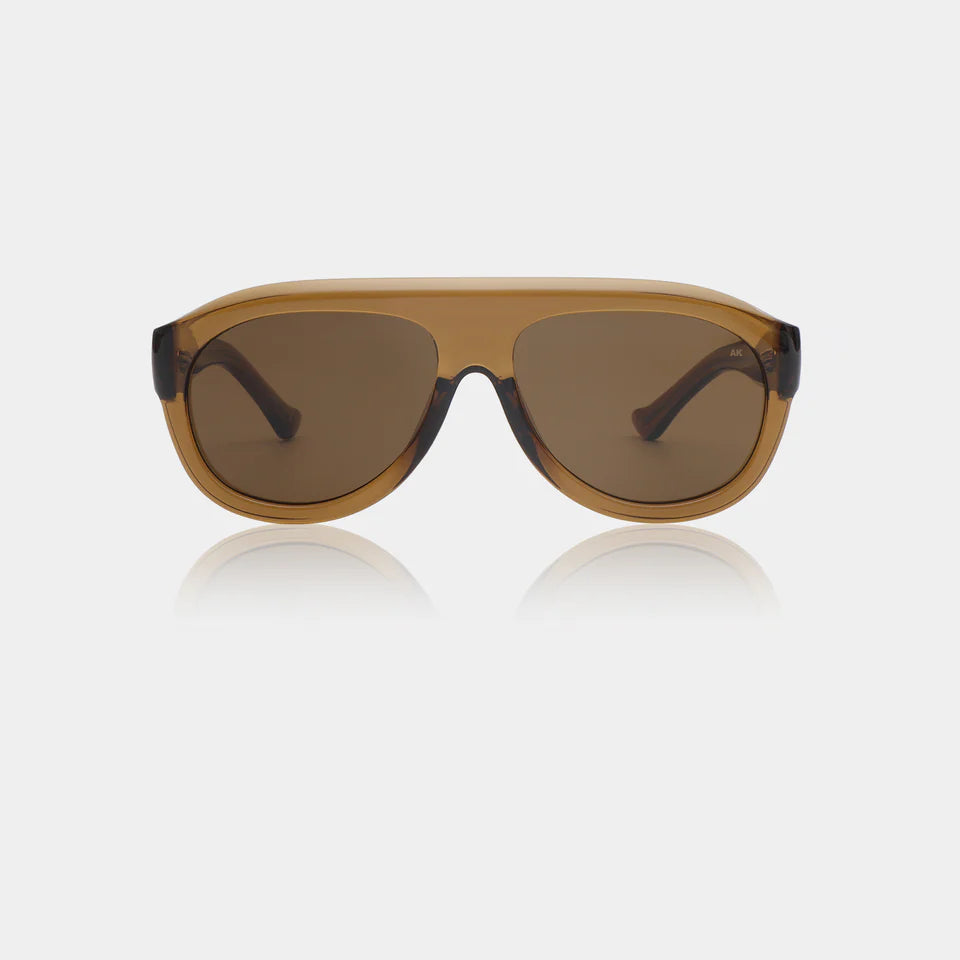 RIO - Smoke Transparent Sunglasses by A.Kjaerbede featuring oversized frames and UV 400 protection.