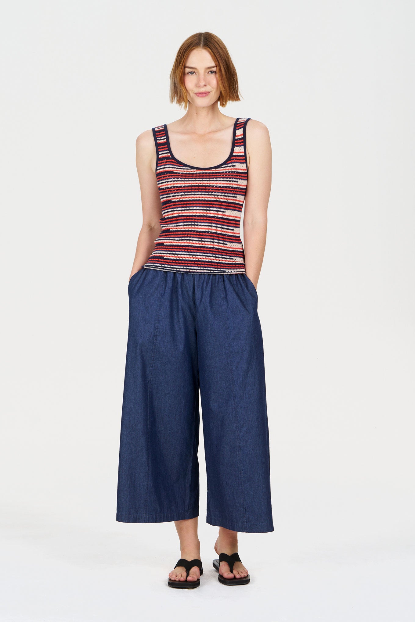 Model wearing ROSARIA Organic Cotton Vest with wide-leg jeans, showcasing a casual summer outfit.