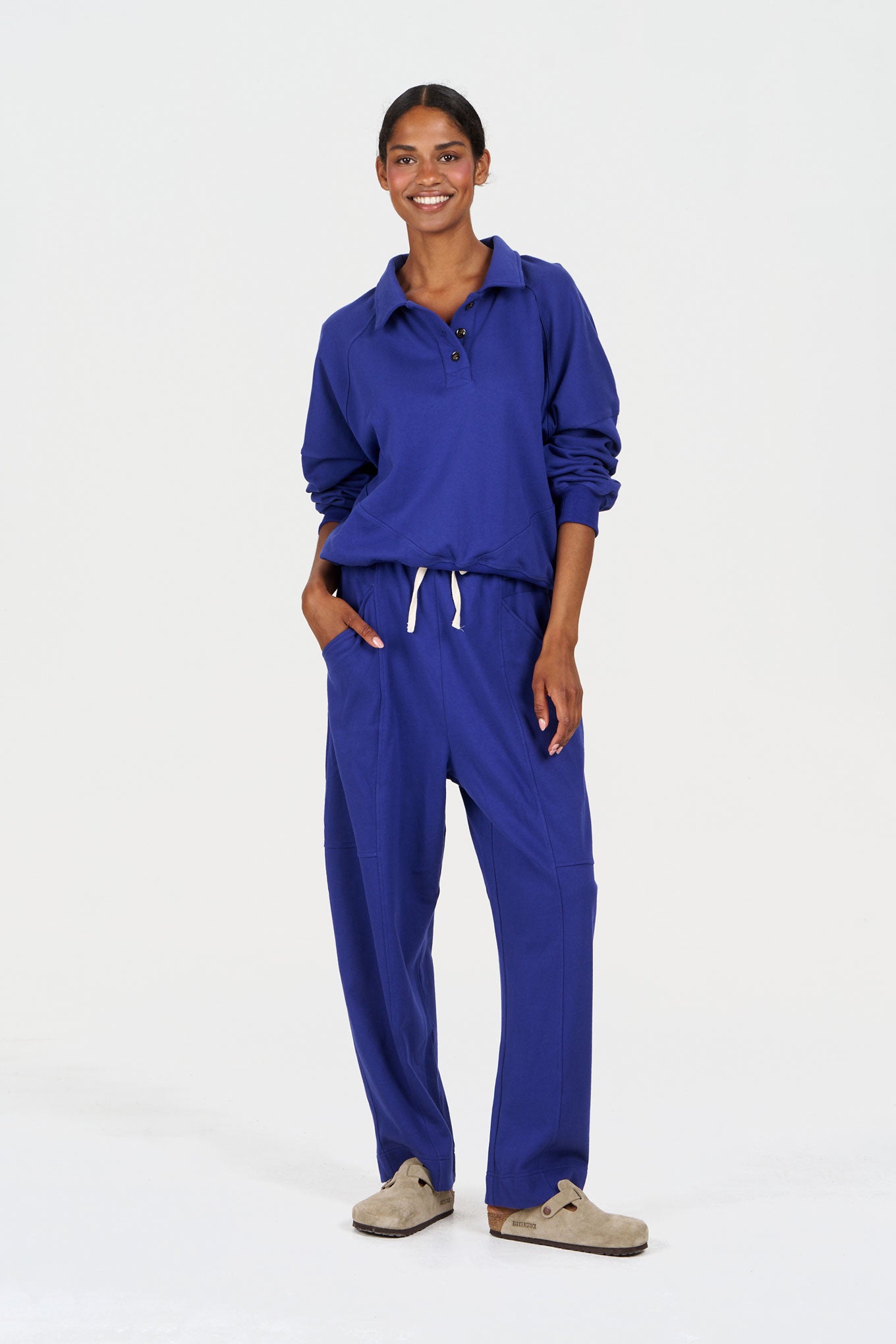 MARA Organic Cotton Jogger - Blue worn by a model, stylish and comfortable fit, perfect for casual outings.