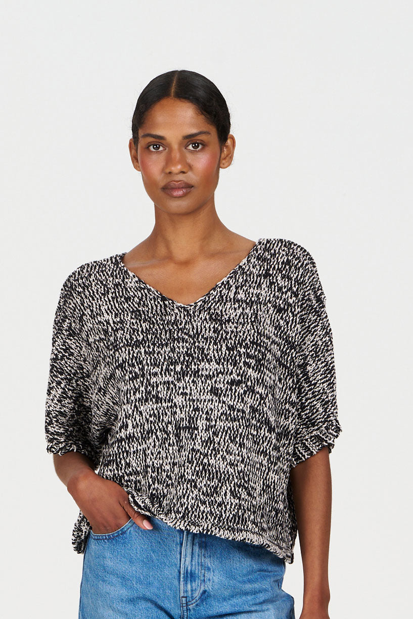 Model wearing TERESA Organic Cotton Jumper - Black & White, featuring a casual fit and unique texture.