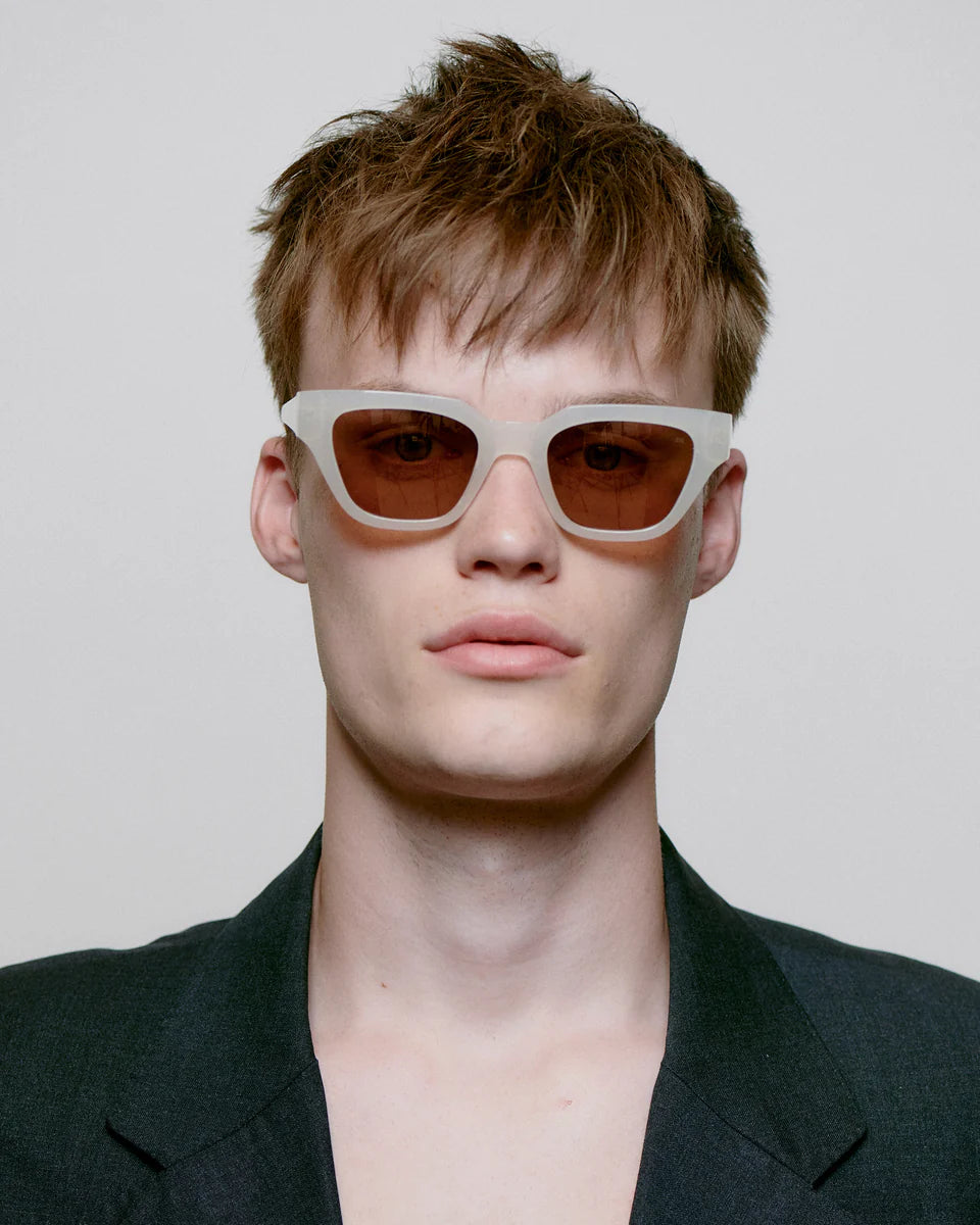 KAWS - Cream Bone Sunglasses by A.Kjaerbede