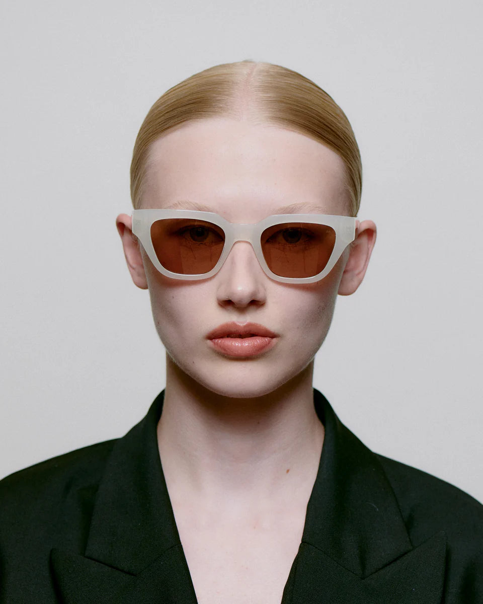 KAWS - Cream Bone Sunglasses by A.Kjaerbede