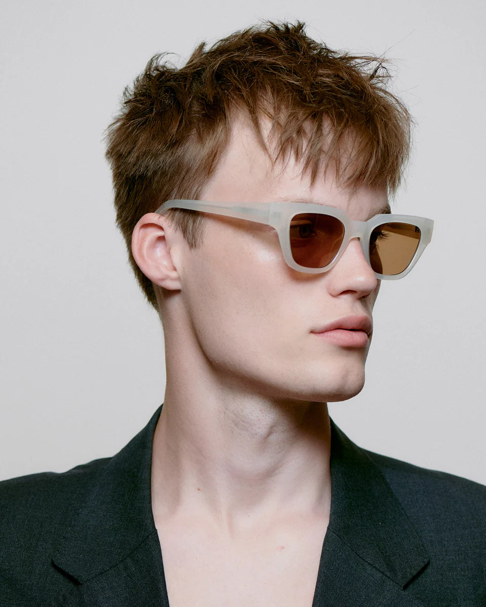 KAWS - Cream Bone Sunglasses by A.Kjaerbede