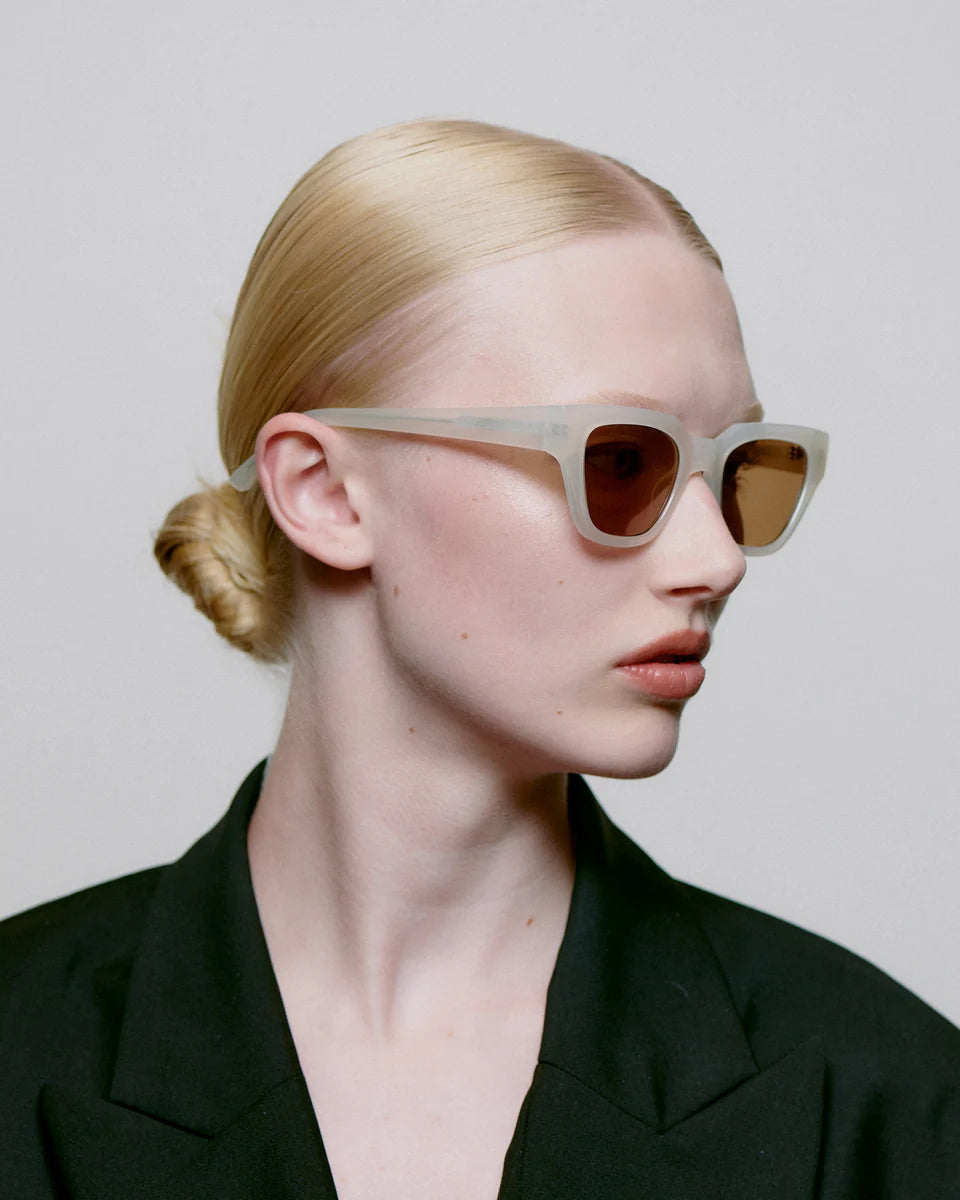 KAWS - Cream Bone Sunglasses by A.Kjaerbede