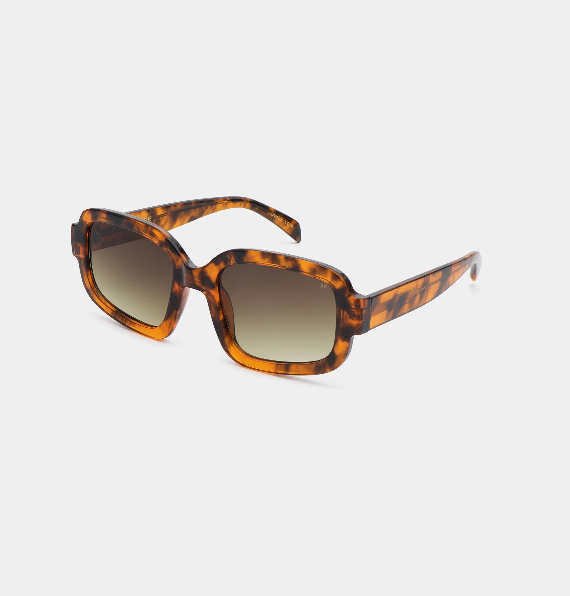 PLUTO - Havana Sunglasses by A.Kjaerbede featuring oversized tortoiseshell frame with tinted lenses.