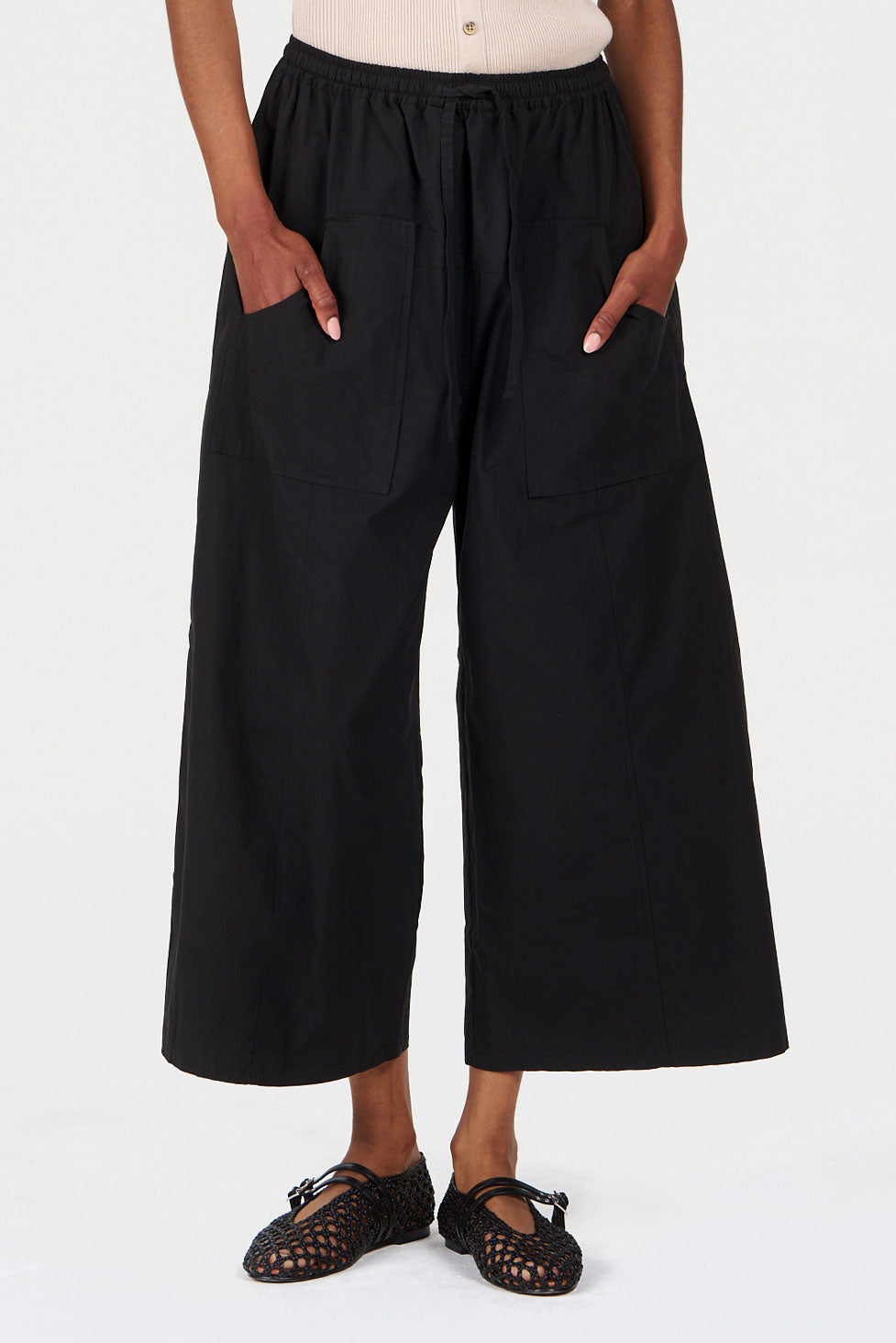 CLEO Organic Cotton Trouser - Black featuring a relaxed fit and pockets for a sustainable fashion choice.