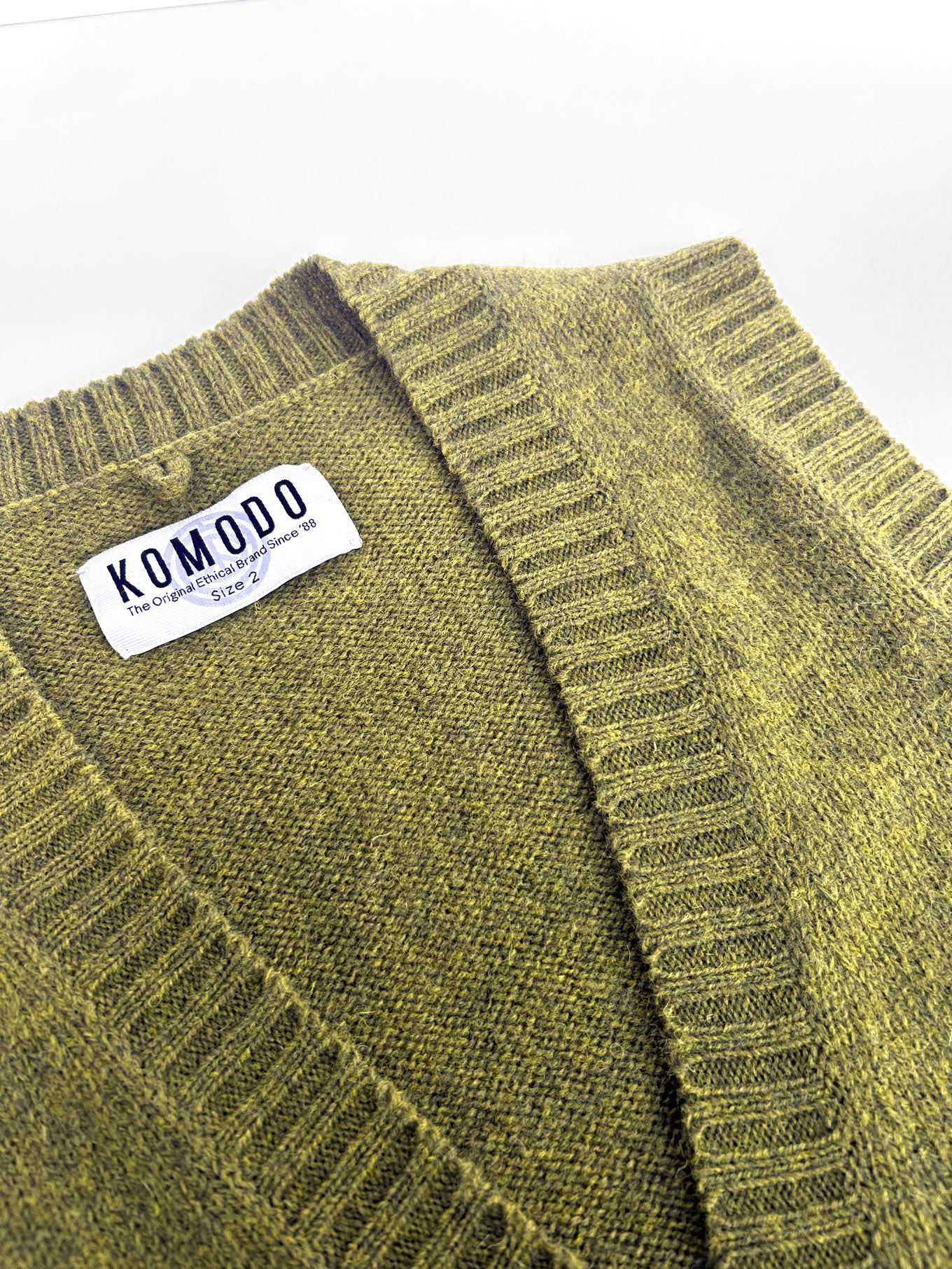 Button detailing on the garment. Organic and natural fibre, sustainable womens top's by KOMODO.