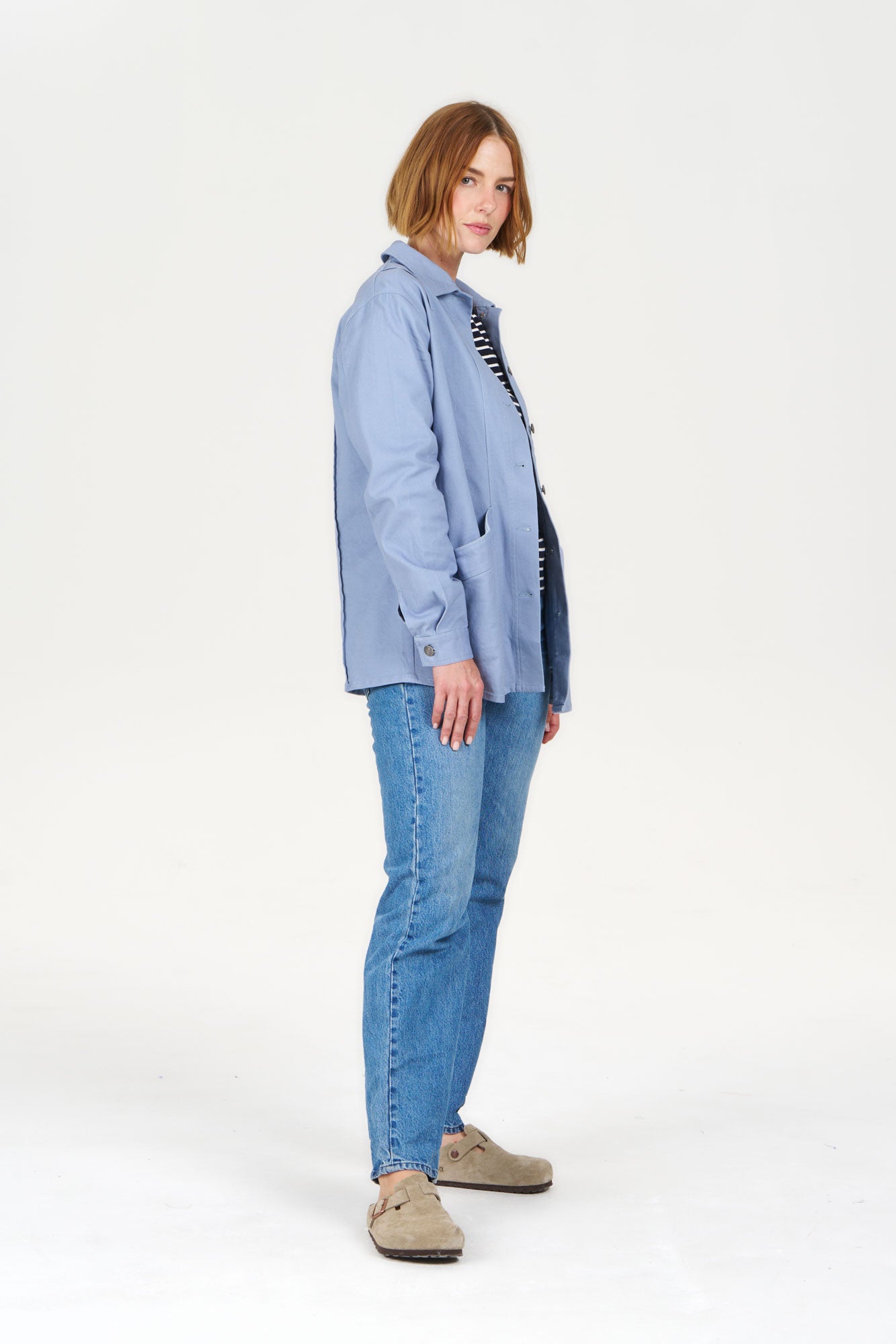 Model wearing CHORE Organic Cotton Jacket - Blue, showcasing its stylish design and eco-friendly material.