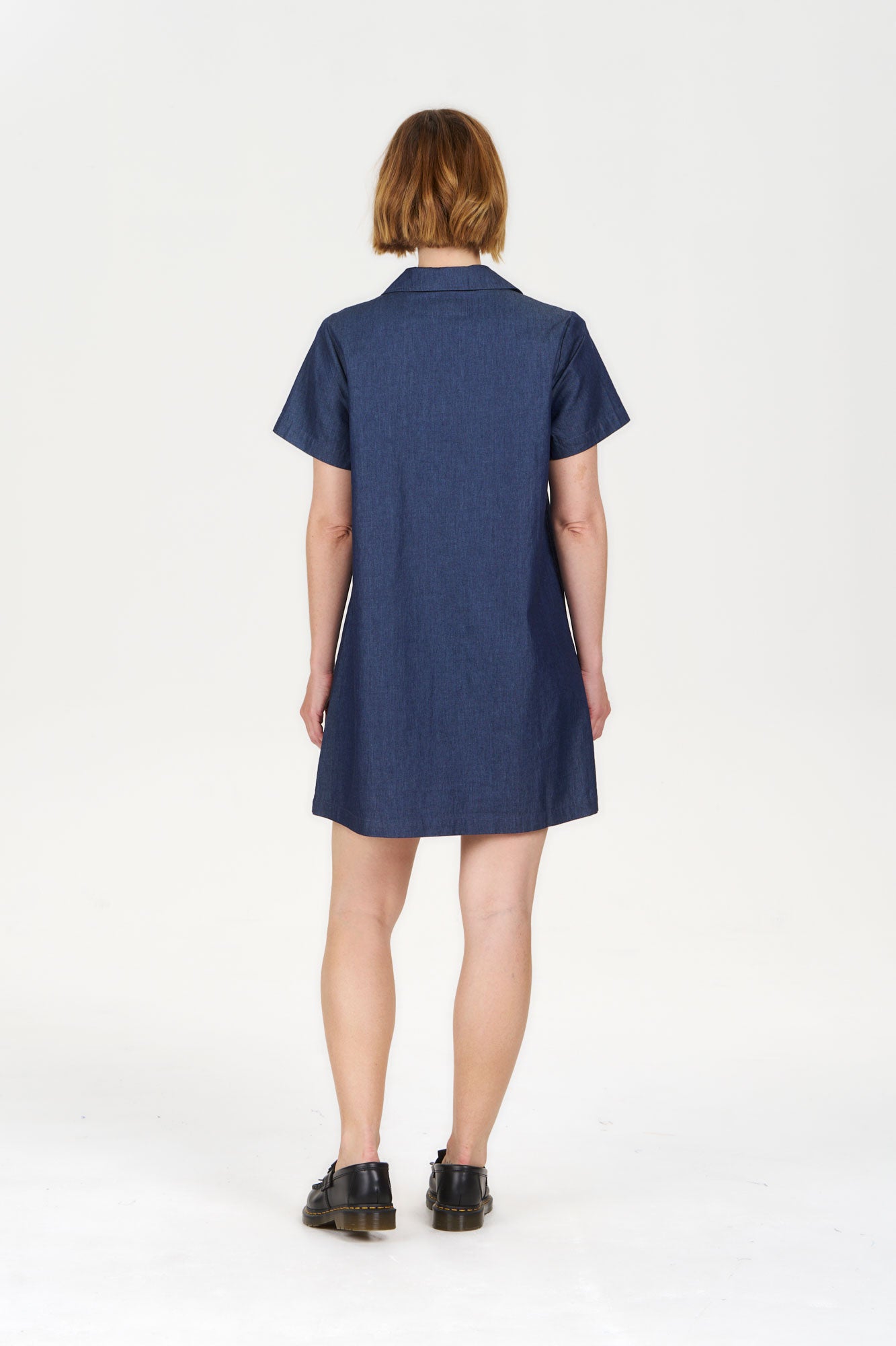 TALIA Organic Cotton dress - midwash model showcasing back view on a plain background