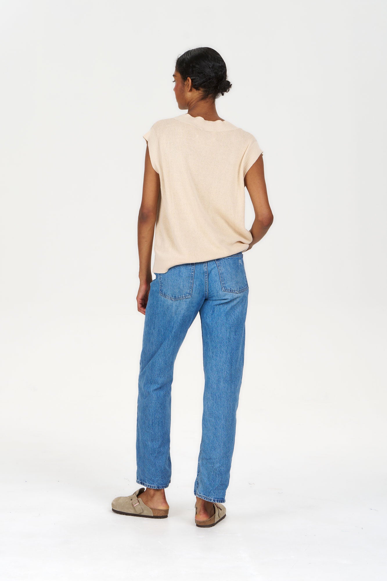 SANDER Organic Ramie Cotton Vest - Sand worn with blue jeans, showcasing a casual and eco-friendly style.