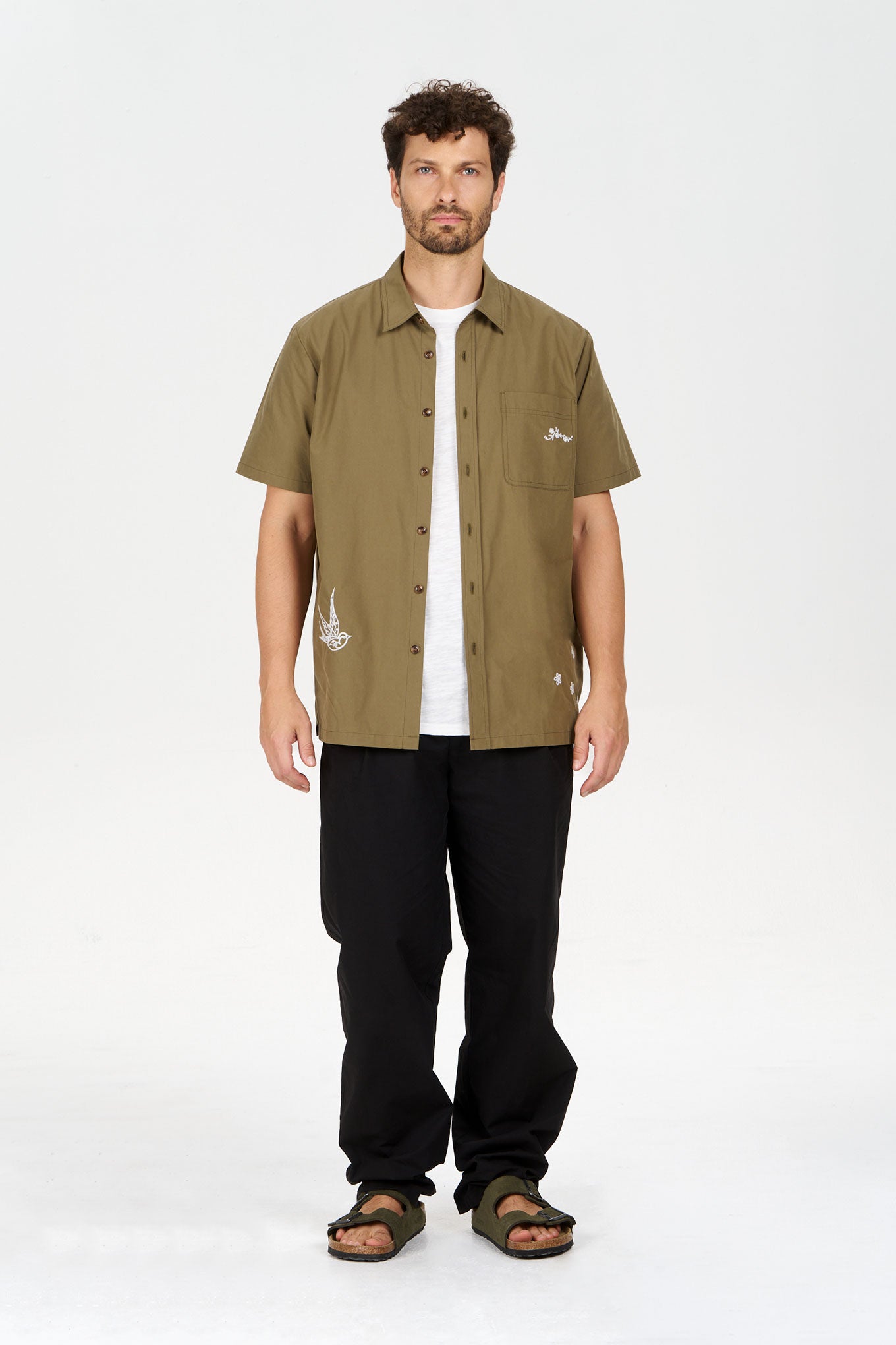 LOYLE Organic Cotton Shirt - Olive, model wearing organic cotton shirt in olive color, paired with black pants.