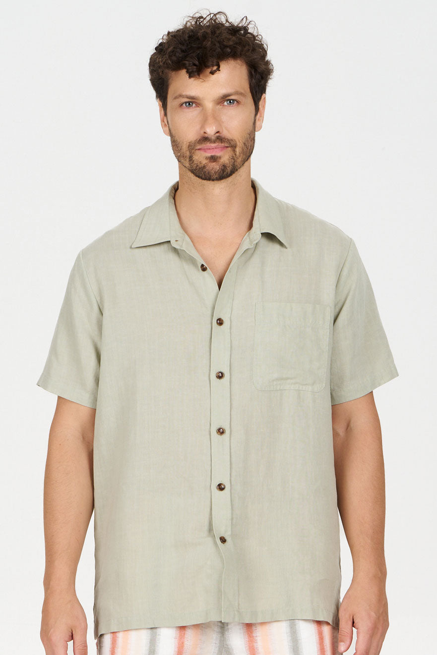 LOYLE Tencel Linen Shirt - Sage displayed on a model, showcasing its loose fit and eco-friendly material.
