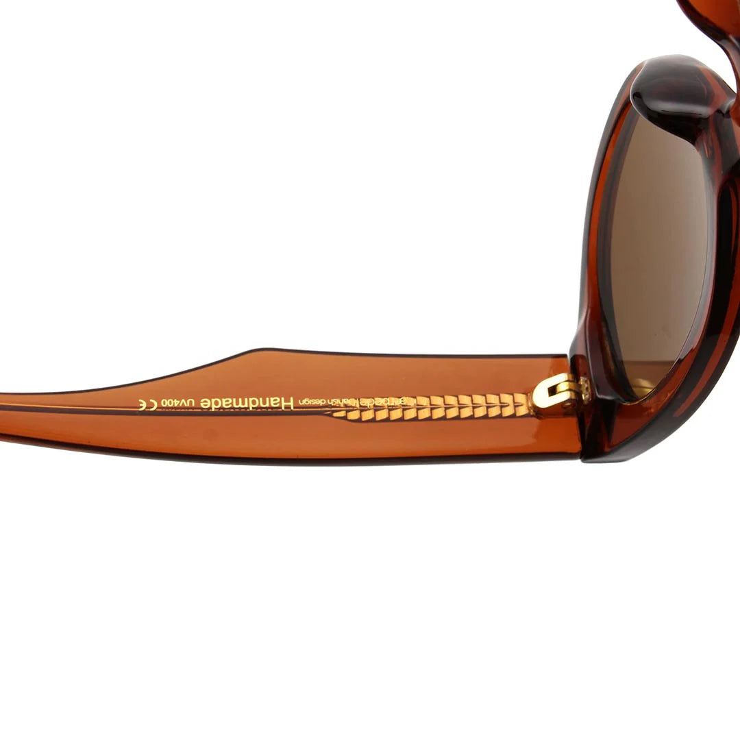 WINNIE - Brown Sunglasses by A.Kjaerbede side view showing the brown lens and bold frame design.